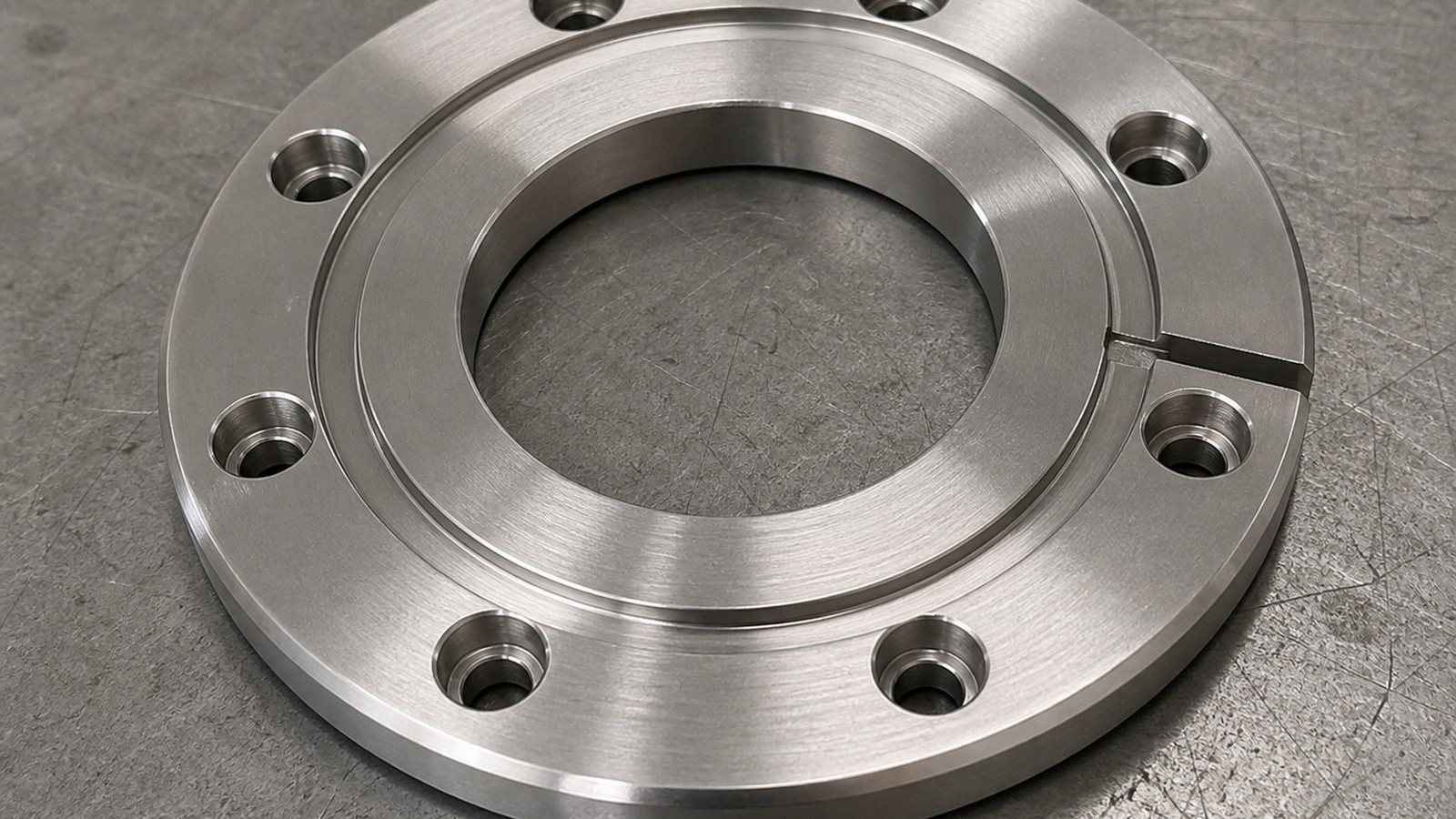 Mecanizado CNC de una brida circular de acero inoxidable para equipos de ensamblaje automatizado